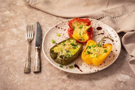 Photo for Keto diet dish - pepper stuffed with eggs, cheese and bacon , baked in oven. - Royalty Free Image