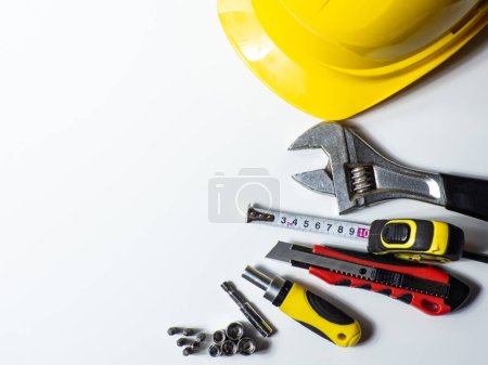 Construction tools, hard hat on white background with copy space. Construction greeting card. For advertising or web design. Repair home. Flat lay Poster 622980028