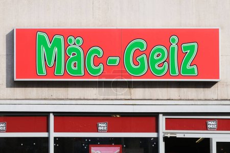 Photo for Berlin, Germany, 2 March 2024, Mc Geiz logo above shop on Kottbusser Damm in Neukolln - Royalty Free Image