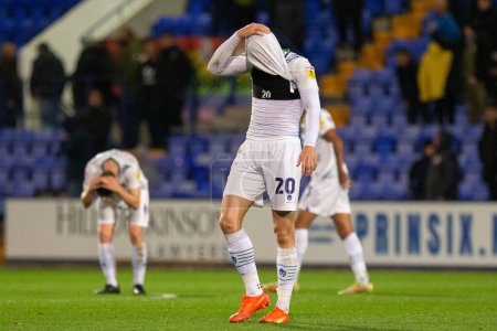 Photo for Elliott Nevitt #20 of Tranmere Rovers and team mates look on dejected during the Sky Bet League 2 match Tranmere Rovers vs Rochdale at Prenton Park, Birkenhead, United Kingdom, 25th October 202 - Royalty Free Image
