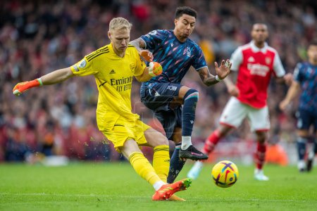 Photo for Jesse Lingard #11 of Nottingham Forest chases down Aaron Ramsdale #1 of Arsenal during the Premier League match Arsenal vs Nottingham Forest at Emirates Stadium, London, United Kingdom, 30th October 202 - Royalty Free Image