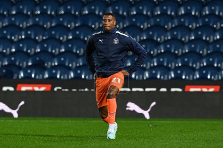 Photo for Marvin Ekpiteta #21 of Blackpool during the pre-game warmup tahead of he Sky Bet Championship match West Bromwich Albion vs Blackpool at The Hawthorns, West Bromwich, United Kingdom, 1st November 202 - Royalty Free Image