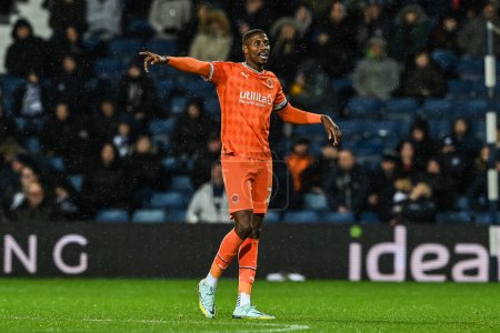 Photo for Marvin Ekpiteta #21 of Blackpool gives his team instructions during the Sky Bet Championship match West Bromwich Albion vs Blackpool at The Hawthorns, West Bromwich, United Kingdom, 1st November 202 - Royalty Free Image