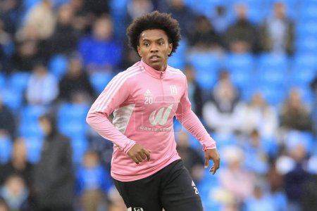 Photo for Willian #20 of Fulham warms up for the game ahead of the Premier League match Manchester City vs Fulham at Etihad Stadium, Manchester, United Kingdom, 5th November 202 - Royalty Free Image