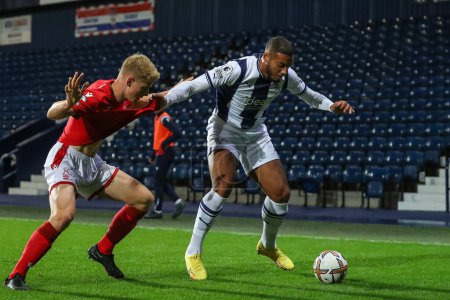 Photo for Kenneth Zohore #9 of West Bromwich Albion protects the ball during the Premier League 2 U23 match West Bromwich Albion U23 vs Nottingham ForestU 23 at The Hawthorns, West Bromwich, United Kingdom, 7th November 202 - Royalty Free Image