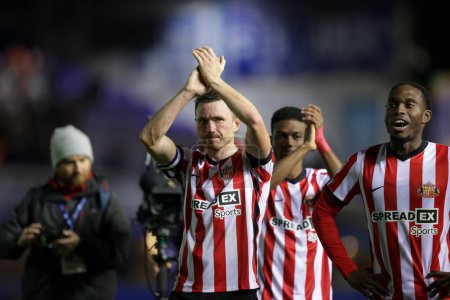 Photo for Corry Evans #4 of Sunderland applauds supporters after the final whistle in the Sky Bet Championship match Birmingham City vs Sunderland at St Andrews, Birmingham, United Kingdom, 11th November 202 - Royalty Free Image