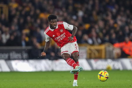 Photo for Thomas Partey #5 of Arsenal passes the ball during the Premier League match Wolverhampton Wanderers vs Arsenal at Molineux, Wolverhampton, United Kingdom, 12th November 202 - Royalty Free Image