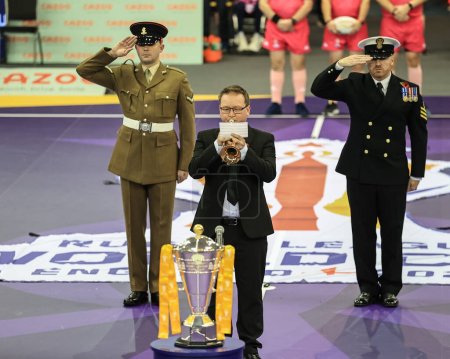 Photo for A bugler plays The Last Post as part of Remembrance Day during the Wheelchair Rugby League World Cup 2021 Semi Final match France vs Australia at English Institute of Sport Sheffield, Sheffield, United Kingdom, 13th November 202 - Royalty Free Image