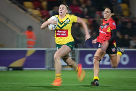 Photo for Jaime Chapman #15 of Australia Women breaks free for a try during the Women's Rugby League World Cup Semi Final match Australia Women vs Papua New Guinea Women at LNER Community Stadium, York, United Kingdom, 14th November 202 - Royalty Free Image