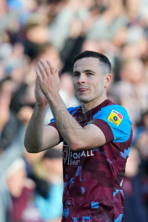 Photo for Josh Cullen #24 of Burnley salutes the fans after the Sky Bet Championship match Burnley vs Blackburn Rovers at Turf Moor, Burnley, United Kingdom, 13th November 202 - Royalty Free Image