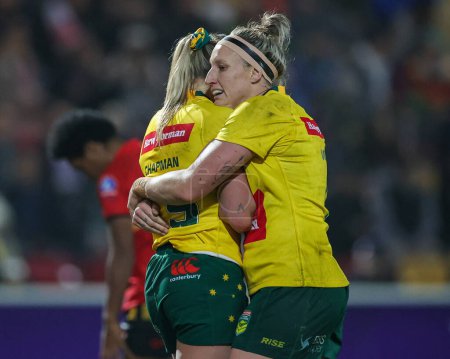 Photo for Jaime Chapman #15 of Australia Women celebrates her try  with team mate during the Women's Rugby League World Cup Semi Final match Australia Women vs Papua New Guinea Women at LNER Community Stadium, York, United Kingdom, 14th November 202 - Royalty Free Image