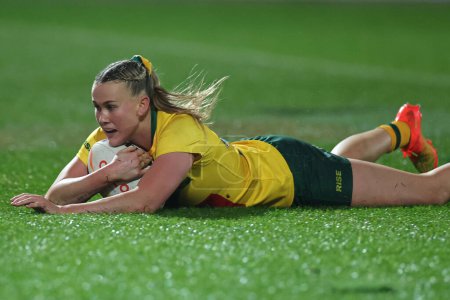 Photo for Jaime Chapman #15 of Australia Women goes over for a try during the Women's Rugby League World Cup Semi Final match Australia Women vs Papua New Guinea Women at LNER Community Stadium, York, United Kingdom, 14th November 202 - Royalty Free Image