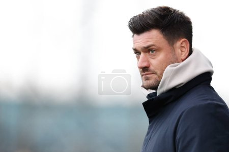 Photo for Johnnie Jackson manager of AFC Wimbledon watches on during the Sky Bet League 2 match Tranmere Rovers vs AFC Wimbledon at Prenton Park, Birkenhead, United Kingdom, 19th November 2022 - Royalty Free Image