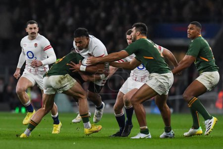 Photo for Manu Tuilagi of England is tackled by Jesse Kriel of South Africa during the Autumn internationals match England vs South Africa at Twickenham Stadium, Twickenham, United Kingdom, 26th November 2022 - Royalty Free Image