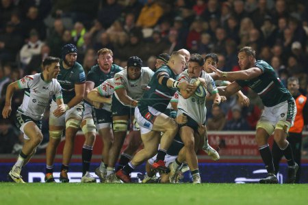 Photo for Mike Willemse of London Irish is tackled by Joe Heyes of Leicester Tigers during the Gallagher Premiership match Leicester Tigers vs London Irish at Mattioli Woods Welford Road, Leicester, United Kingdom, 27th November 2022 - Royalty Free Image
