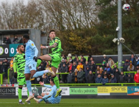 Photo for Oliver Casey #5 of Forest Green Rovers has a shot at goal during the Sky Bet League 1 match Forest Green Rovers vs Cambridge United at The New Lawn, Nailsworth, United Kingdom, 3rd December 202 - Royalty Free Image
