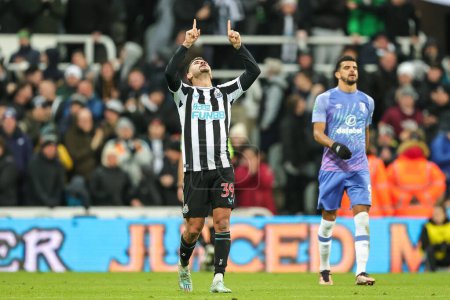 Photo for Bruno Guimares of Newcastle United celebrates Adam Smith #15 of Bournemouth scores an own goal to make it 1-0 during the Carabao Cup Fourth Round match Newcastle United vs Bournemouth at St. James's Park, Newcastle, United Kingdom, 20th December - Royalty Free Image