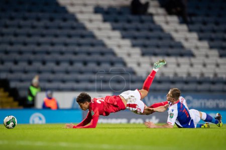 Photo for Brennan Johnson #20 of Nottingham Forest is upended for his penalty during the Carabao Cup Fourth Round match Blackburn Rovers vs Nottingham Forest at Ewood Park, Blackburn, United Kingdom, 21st December 202 - Royalty Free Image