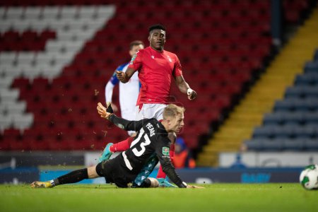 Photo for Taiwo Awoniyi #9 of Nottingham Forest scores his teams third during the Carabao Cup Fourth Round match Blackburn Rovers vs Nottingham Forest at Ewood Park, Blackburn, United Kingdom, 21st December 202 - Royalty Free Image