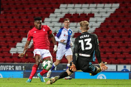 Photo for Taiwo Awoniyi #9 of Nottingham Forest scores to make it 1-3 during the Carabao Cup Fourth Round match Blackburn Rovers vs Nottingham Forest at Ewood Park, Blackburn, United Kingdom, 21st December 202 - Royalty Free Image