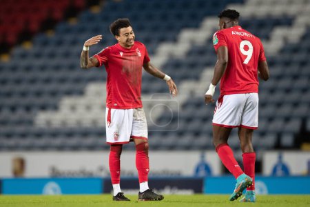 Photo for Taiwo Awoniyi #9 of Nottingham Forest celebrates his goal with Jesse Lingard #11 of Nottingham Forest during the Carabao Cup Fourth Round match Blackburn Rovers vs Nottingham Forest at Ewood Park, Blackburn, United Kingdom, 21st December 202 - Royalty Free Image