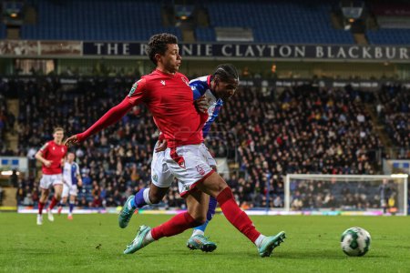 Photo for Brennan Johnson #20 of Nottingham Forest crosses the ball during the Carabao Cup Fourth Round match Blackburn Rovers vs Nottingham Forest at Ewood Park, Blackburn, United Kingdom, 21st December 202 - Royalty Free Image