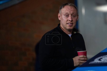 Photo for Steve Cooper manager of Nottingham Forest checks out the pitch before the Carabao Cup Fourth Round match Blackburn Rovers vs Nottingham Forest at Ewood Park, Blackburn, United Kingdom, 21st December 202 - Royalty Free Image