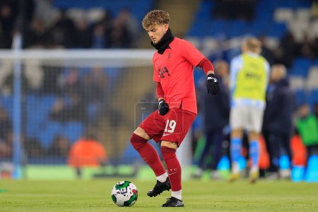 Photo for Harvey Elliott #19 of Liverpool during the pre-game warm up ahead of the Carabao Cup Fourth Round match Manchester City vs Liverpool at Etihad Stadium, Manchester, United Kingdom, 22nd December 202 - Royalty Free Image