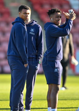 Photo for Plymouth Argyle forward Morgan Whittaker (19) and Plymouth Argyle forward Niall Ennis  (11) walks on and inspect the pitch  during the Sky Bet League 1 match Cheltenham Town vs Plymouth Argyle at The Jonny-Rocks Stadium, Cheltenham, United Kingdom, 2 - Royalty Free Image