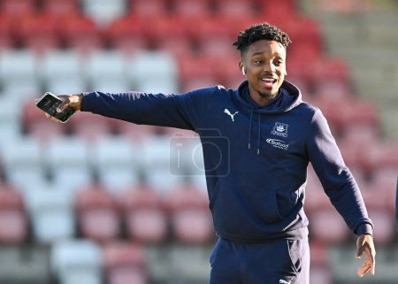 Photo for Plymouth Argyle forward Niall Ennis  (11) walks on and inspect the pitch  during the Sky Bet League 1 match Cheltenham Town vs Plymouth Argyle at The Jonny-Rocks Stadium, Cheltenham, United Kingdom, 26th December 202 - Royalty Free Image