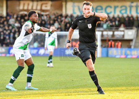Photo for Plymouth Argyle full back Bali Mumba  (17)  appeals to official for foul during the Sky Bet League 1 match Cheltenham Town vs Plymouth Argyle at The Jonny-Rocks Stadium, Cheltenham, United Kingdom, 26th December 202 - Royalty Free Image