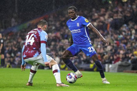 Photo for Emmanuel Longelo #23 of Birmingham City takes on Connor Roberts #14 of Burnley during the Sky Bet Championship match Burnley vs Birmingham City at Turf Moor, Burnley, United Kingdom, 27th December 202 - Royalty Free Image