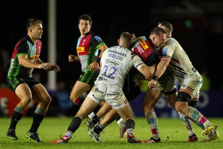 Photo for Alex Dombrandt of Harlequins is double-tackled during the Gallagher Premiership match Harlequins vs Bristol Bears at Twickenham Stoop , London, United Kingdom, 27th December 202 - Royalty Free Image
