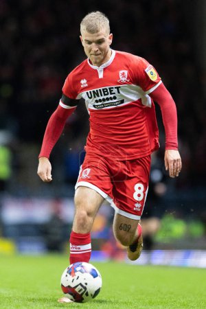 Photo for Riley McGree #8 of Middlesborough in possession during the Sky Bet Championship match Blackburn Rovers vs Middlesbrough at Ewood Park, Blackburn, United Kingdom, 29th December 202 - Royalty Free Image