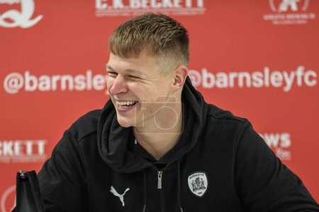 Photo for Mads Andersen #6 of Barnsley speaks to the press after Barnsley win 2-1 as he marks his 150th game for the club during the Sky Bet League 1 match Barnsley vs Fleetwood Town at Oakwell, Barnsley, United Kingdom, 29th December 202 - Royalty Free Image