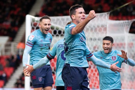 Photo for Josh Cullen #24 of Burnley celebrates his goal to make it 0-1 during the Sky Bet Championship match Stoke City vs Burnley at Bet365 Stadium, Stoke-on-Trent, United Kingdom, 30th December 202 - Royalty Free Image