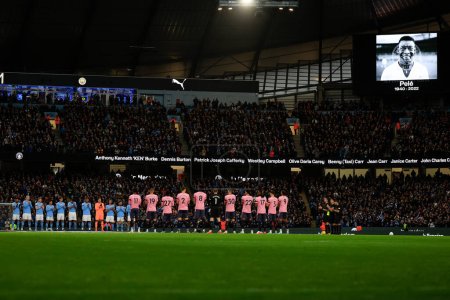 Photo for The teams Gove a minutes applause for Pele ahead of the Premier League match Manchester City vs Everton at Etihad Stadium, Manchester, United Kingdom, 31st December 202 - Royalty Free Image
