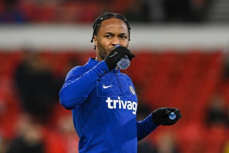Photo for Raheem Sterling #17 of Chelsea takes a drink during during the pre-game warmup ahead of the Premier League match Nottingham Forest vs Chelsea at City Ground, Nottingham, United Kingdom, 1st January 202 - Royalty Free Image
