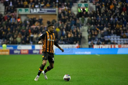 Foto de Cyrus Christie #33 of Hull City in possession during the Sky Bet Championship match Wigan Athletic vs Hull City at DW Stadium, Wigan, United Kingdom, 2nd January 202 - Imagen libre de derechos