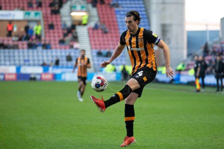 Photo for Jacob Greaves #4 of Hull City controls the ball during the Sky Bet Championship match Wigan Athletic vs Hull City at DW Stadium, Wigan, United Kingdom, 2nd January 202 - Royalty Free Image