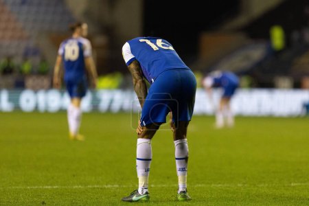 Photo for A dejected Curtis Tilt #16 of Wigan Athletic during the Sky Bet Championship match Wigan Athletic vs Hull City at DW Stadium, Wigan, United Kingdom, 2nd January 202 - Royalty Free Image