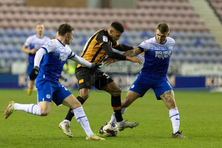 Photo for Cyrus Christie #33 of Hull City in possession during the Sky Bet Championship match Wigan Athletic vs Hull City at DW Stadium, Wigan, United Kingdom, 2nd January 202 - Royalty Free Image