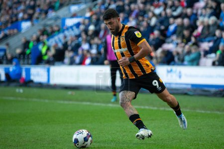Photo for Allahyar Sayyadmanesh #9 of Hull City in possession during the Sky Bet Championship match Wigan Athletic vs Hull City at DW Stadium, Wigan, United Kingdom, 2nd January 202 - Royalty Free Image