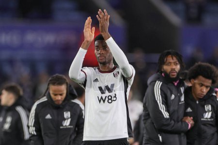 Photo for Tosin Adarabioyo #4 of Fulham applauds the travelling fans after the Premier League match Leicester City vs Fulham at King Power Stadium, Leicester, United Kingdom, 3rd January 202 - Royalty Free Image