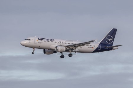Photo for A Lufthansa Airbus A320-211 lands at Manchester Airport on the eve of Sunshine Saturday where holiday firms expect booking to return to pre-covid levels; Manchester Airport at Manchester Airport, Manchester, United Kingdom, 6th January 202 - Royalty Free Image
