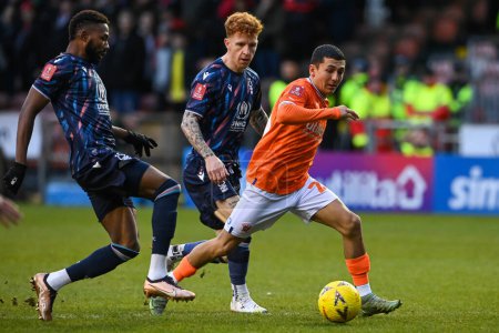 Photo for Ian Poveda #26 of Blackpool makes a break with the ball  during the Emirates FA Cup Third Round match Blackpool vs Nottingham Forest at Bloomfield Road, Blackpool, United Kingdom, 7th January 202 - Royalty Free Image
