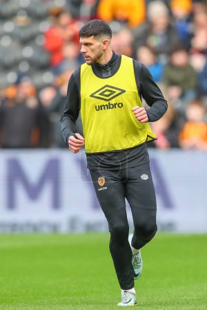 Photo for Tobias Figueiredo #6 of Hull City during the pre-game warm up ahead of the Emirates FA Cup Third Round match Hull City vs Fulham at MKM Stadium, Hull, United Kingdom, 7th January 202 - Royalty Free Image