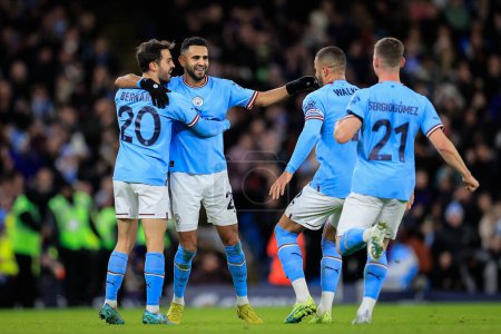 Foto de Riyad Mahrez #26 of Manchester City celebrates his goal with his team mates and makes the score 1-0 during the Emirates FA Cup Third Round match Manchester City vs Chelsea at Etihad Stadium, Manchester, United Kingdom, 8th January 202 - Imagen libre de derechos