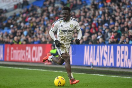 Photo for Wilfried Gnonto #29 of Leeds United runs with the ball during the Emirates FA Cup Third Round match Cardiff City vs Leeds United at Cardiff City Stadium, Cardiff, United Kingdom, 8th January 202 - Royalty Free Image