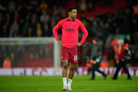 Téléchargez les photos : Cody Gakpo #18 of Liverpool warms up before the Emirates FA Cup Third Round match Liverpool vs Wolverhampton Wanderers at Anfield, Liverpool, United Kingdom, 7th January 202 - en image libre de droit